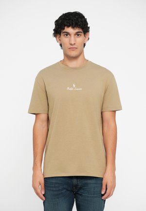 Beige cotton t-shirt with short sleeves, crew neck, features white "Ralph Lauren" logo and polo player embroidered on the chest.