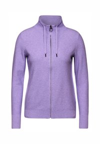 Cardigan zippé violet en tissu texturé. Présente un col montant, des poignets côtelés et des cordons de serrage ajustables sur la fermeture éclair.