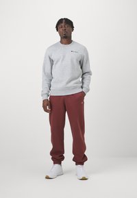 Champion ICONS CUFF PANTS - Treniņtērpa apakšdaļas - dark brown