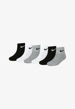 Šest parova čarapa do gležnja u crnoj, bijeloj i sivoj boji, izrađene od pamuka s rebrastom teksturom i Nike swoosh logotipom na gležnju.