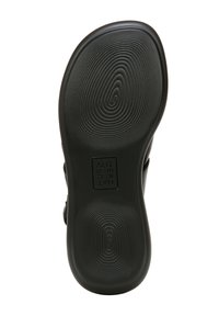 Suola di sandaletta nera con un motivo ondulato testurizzato e bordi lisci. Presenta un'impronta del logo e un materiale flessibile e resistente.
