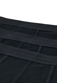 Svarta bomullskalsonger med en tjock elastisk midjeband som har en präglad "SPRINGFIELD"-logotyp. Slät textur och tight passform.