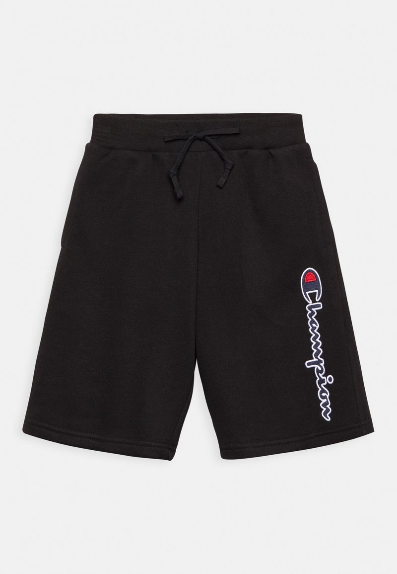 Short noir à cordon avec le logo Champion verticalement sur la jambe droite, avec une taille élastique simple et sans poches visibles.