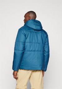 Vaude NEYLAND HOODED  - Giacca invernale - baltic sea