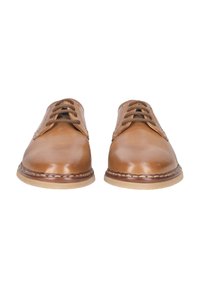 Braune Leder-Schuhe mit glänzender Oberfläche, im Schnürdesign, runder Spitze und einer hellen Gummisohle mit genähtem Rand.