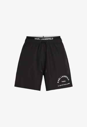 Mustad ujumispüksid, millel on nööriga vöökoht, ühel küljel valge tekst "KARL LAGERFELD PARIS 21 RUE ST-GUILLAUME". Sile kangastus.