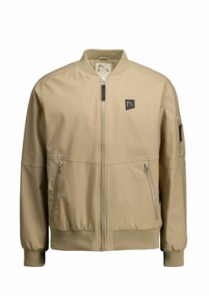 Gaiši bēšs bombers ar rāvējslēdzēju priekšpusē, ribainām aprocēm un divām sānu kabatām ar rāvējslēdzējiem. Kreisajā krūtīs ir mazs logotips.