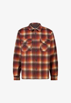 Flannel shirt in orange, red, and brown plaid pattern; long sleeves, buttoned front, two chest pockets, rounded collar, soft texture.