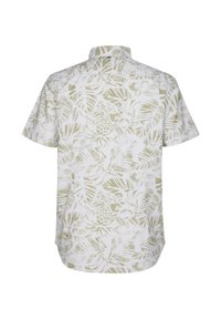 Camisa de manga corta de algodón blanco con un patrón de hojas tropicales verdes. Presenta un cuello y un dobladillo recto en la parte trasera.