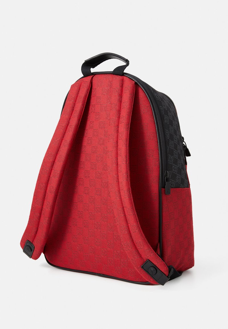 jordan monogram mini backpack red Nike 7A0761-R7 Version Sports & Outdoors zipper closure Smaller zippered front compartment Padded shoulder straps Top haul loop Metallic details Number 23 allover print The Jordan Monogram Backpack is imported Nike Air Jordan Mini Backpack,