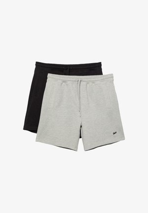 Dva páry voľných šortiek, jeden svetlosivý a jeden čierny, oba so šnúrkami a bočnými vreckami, rozložené na bielom pozadí s prekrývaním.