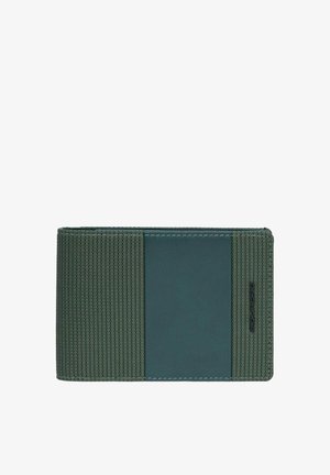 Grüne Geldbörse mit strukturiertem Stoff auf einer Seite und glattem, einfarbigem Material auf der anderen Seite. Rechteckige Form mit dezenten Ziernähten.