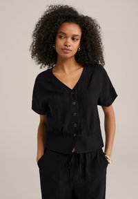 Pluus - black
