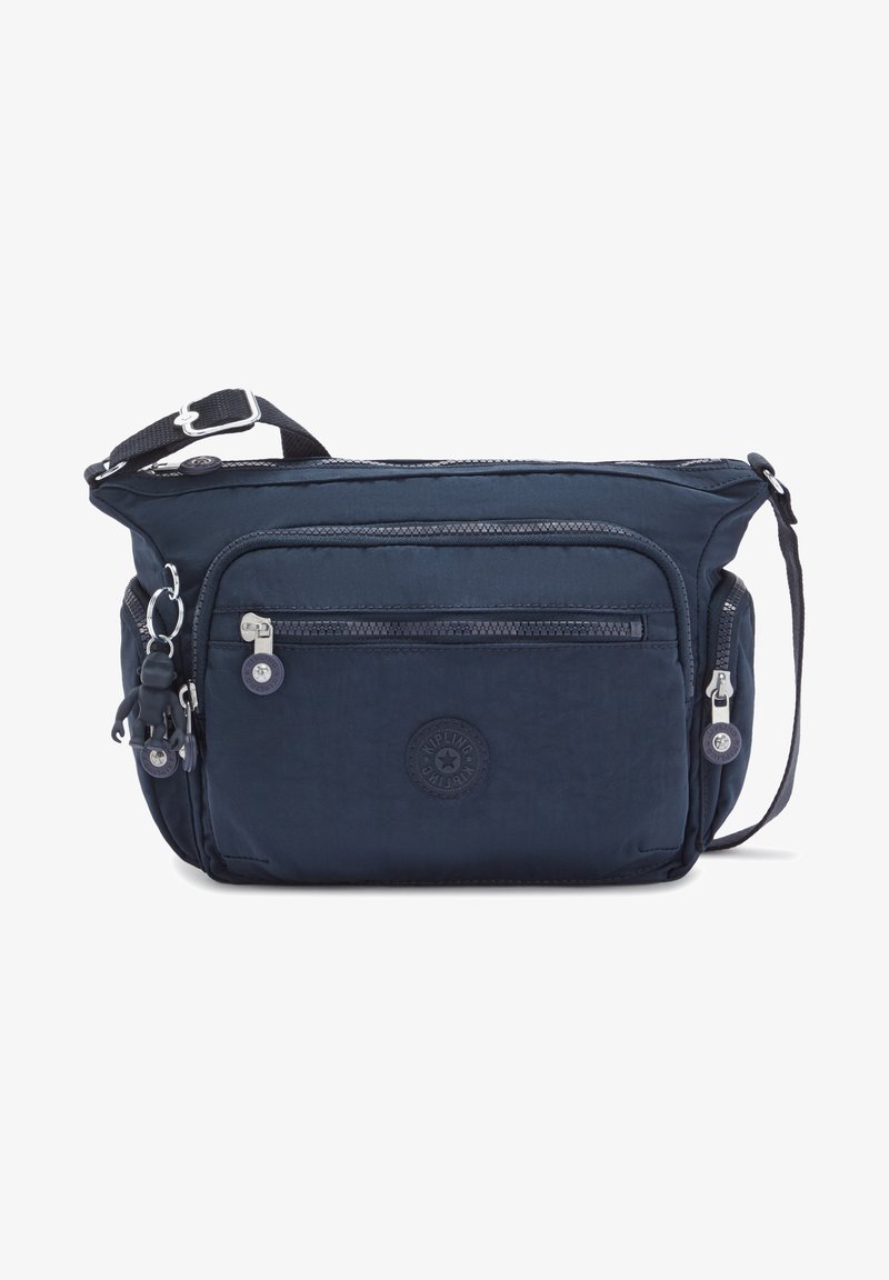 Bolso cruzado navy hecho de un tejido duradero, con múltiples compartimentos con cremallera, un parche con el logo y una correa ajustable.