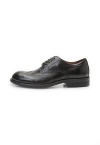 Scarpa da uomo in pelle nera con design brogue, punta rotonda e cinque occhielli per i lacci. Suola piatta con un tacco leggero per una maggiore stabilità.
