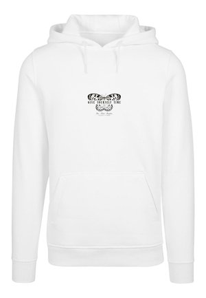 Sudadera blanca con un bolsillo frontal y capucha con cordón. Presenta un gráfico de mariposa negra con el texto "DATE TIEMPO A TI" debajo.