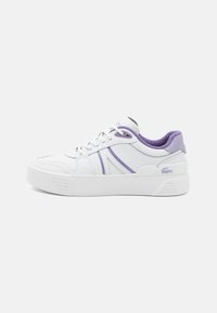 White sneakers with purple accents, rounded toe, low-top design, textured leather upper, and a thick rubber sole. Logo near the heel.