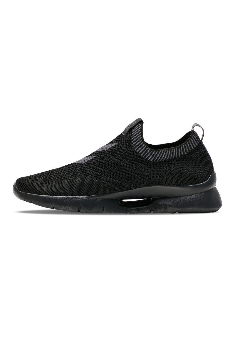 Black slip-on sneaker with a mesh upper, textured pattern, and a padded collar. Features a lightweight, flexible sole with a slight heel.