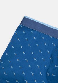 Ropa interior azul para hombres con un patrón de pequeños perros dachshund de color azul claro y una cinturilla azul oscura con una franja azul clara.