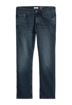 Slim fit jeans in dark blue denim, featuring five pockets, belt loops, and a slight fading effect on the front. Smooth texture throughout.