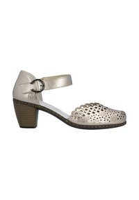 Chaussure femme en cuir beige avec un petit talon bloc, bride de cheville à boucle et motifs floraux perforés sur la zone des orteils.