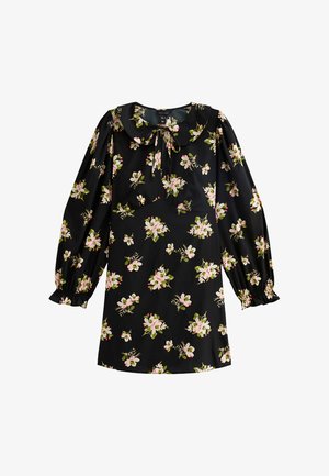 Robe noire à fleurs avec de longues manches bouffantes, un col rond et un détail de nœud. Motif floral en rose et vert, fabriquée en tissu léger.