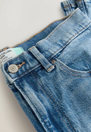 Light blue high-rise denim jeans with a faded texture, featuring a metal button, contrasting stitching, and a tag visible at the waistband.