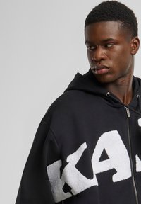 Karl Kani WAVY RETRO OS FULL - Sweatjakke - black