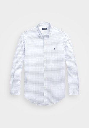 Biała koszula zapinana na guziki z długimi rękawami i niebieskim wzorem w kratę, z małym ciemnoniebieskim logo Polo Ralph Lauren na piersi.