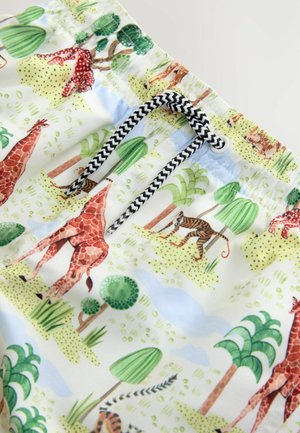Kurze Badehose mit einem weißen Hintergrund, die ein buntes Tiermuster zeigt, einschließlich Giraffen und Tigern, mit einem schwarz-weißen Kordelzug.