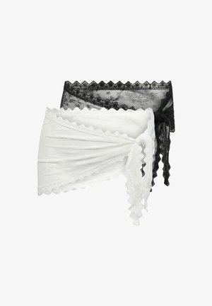 To blonde bandeau-topper, en hvit og en svart, hver med bølgete kanter og detaljer med sideknute.