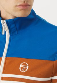 Sergio Tacchini DAMARINDO SET - Tepláková súprava - nautical blue/gardenia/mocha bisque