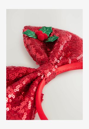 Red sequin headband featuring a large bow, embellished with green holly leaves and red pom-poms at the center, on a smooth headband base.