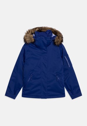 Veste bleu marine avec capuche doublée de fourrure, poches latérales zippées et texture lisse avec coutures de renforcement.