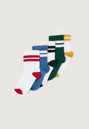 Πέντε ζευγάρια κάλτσες πληρώματος σε διάφορα χρώματα: λευκές με κόκκινες, μπλε, πράσινες, μαύρες και κίτρινες λεπτομέρειες. Ραμμένη υφή, αντίθετες ρίγες.