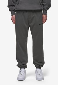 Pegador LOGO JOGGER - Pantalones deportivos - washed anthracite