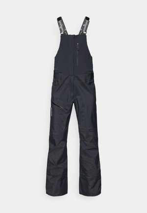 Salopete negre izolate pentru zăpadă, cu bretele reglabile, un buzunar cu fermoar la piept și buzunare frontale cu fermoar. Țesătură netedă, rezistentă la apă.