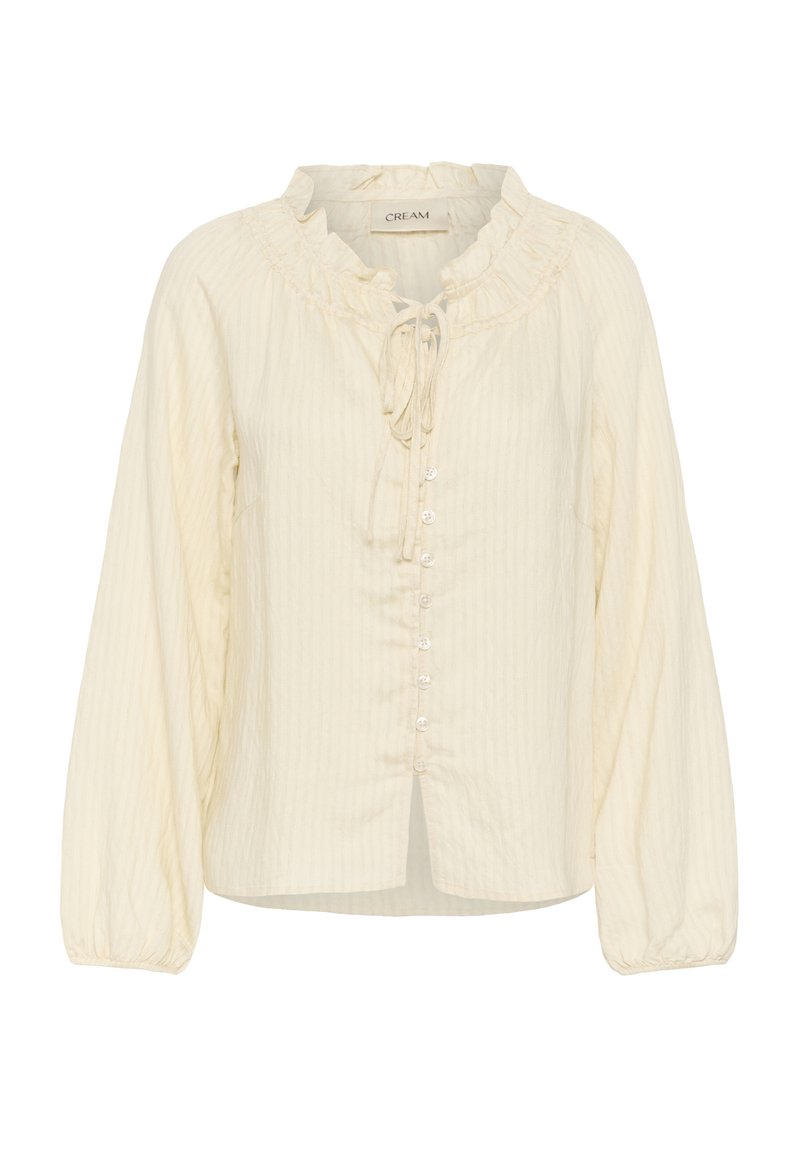 Blouse à manches longues couleur crème avec col à volants, lien sur le devant, rayures verticales et fermeture par boutons.