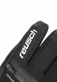Schwarze Handschuhe aus weichem Stoff und Leder mit einem Reißverschlussdetail. Mit weißem "reusch"-Logo und wasserdichter Eigenschaft.