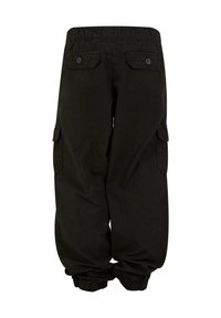 Pantalon cargo noir avec taille et poignets élastiques, doté de poches à rabat boutonnées à l'arrière et sur les côtés.