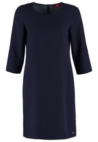 Robe bleu marine longueur genou avec manches trois-quarts et un subtil motif à pois rouges, avec un col rond et une fermeture éclair au dos.
