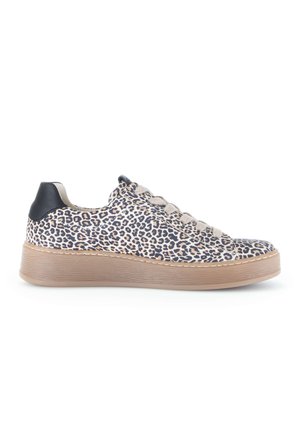 Low platform sneaker with beige and black leopard print, light beige laces, and a black heel tab on a light brown textured sole.
