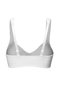 Vitt bralette med justerbara axelband, tillverkat av mjukt, slätt tyg, med en enkel design och sömlös kupa.