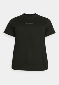 Svart bomull t-shirt med rund hals, korta ärmar och en vit "Calvin Klein"-logotyp tryckt på bröstet. Enkel, klassisk design.
