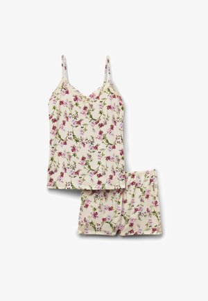 Kremowy zestaw piżamowy w kwiaty z topem na cienkich ramiączkach i dopasowanymi szortami ozdobiony różowo-zielonymi wzorami kwiatowymi.