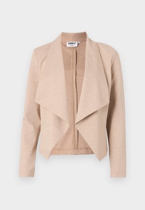 Ανοιχτό μπεζ jacket με φερμουάρ και σχέδιο με κρεμαστή μπροστινή πλευρά, μακριά μανίκια και απαλή υφή. Ετικέτα ορατή μέσα στο λαιμό.