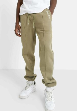 GOTHIC - Tracksuit bottoms - kaki