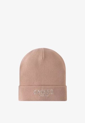 Gorro de punto beige con vuelta, que presenta un logotipo bordado "OMBRE" en beige claro. Textura suave y forma redonda sencilla.