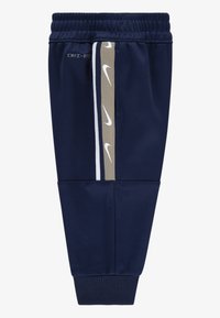 Nike Sportswear CLUB PROPUS UNISEX SET - Pantaloni de trening - midnight navy
