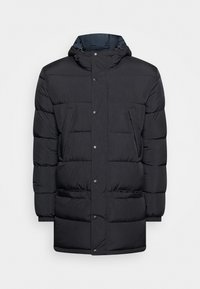 Giacca a vento nera con cappuccio staccabile, bottoni a pressione, due tasche frontali e una texture trapuntata per calore e stile.